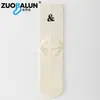 Meias Zobalen Zhujie, meias masculinas de meia-canela para primavera e outono, algodão puro, design com letras pretas e brancas, absorventes de suor e umidade, meias esportivas, atacado