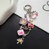 Estilo ins chica cadena de serpiente de hueso de fresa estilo colgante sombrero largo colgante kt cadena de teléfono llavero amuleto de bolsa