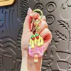 Chaveiro Criativo de Garrafa de Areia Movediça com Sorvete de Bolha de Morango Preenchido com Óleo Desenho Animado Fofo Cor Macaron Pingente para Bolsa de Menina