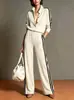 Conjunto de dos piezas a rayas con cuello alto más vendido de Amazon para mujer, con un cárdigan informal de estilo europeo y americano y pantalones largos de pierna ancha, perfecto para ventas transfronterizas