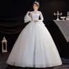 Vestido de Novia Blanco de Encaje con Escote en V y Mangas Largas, Estilo Nuevo 2026, con Tul Brillante y Falda Voluminosa, Vestido Principal de Novia con Belleza de Hada y Elegancia de Princesa