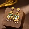 Pendientes vintage de flor de esmalte con borla de perlas, diseño elaborado, pendientes largos huecos, lujo ligero con un toque de alta gama, joyería vintage
