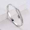Pulsera de mujer con diamantes de imitación dorados geométricos, empaque independiente, personalidad europea y americana, plataforma transfronteriza, joyería de acero de titanio