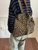 Bolso de hombro con estampado de leopardo otoño/invierno 2026, bolso tote de gran capacidad para el trabajo, bolso cruzado casual de lona para mujer