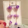 Novo Brinco de Franja com Pérolas e Flor de Lírio Branco Pequena Fresca Moda Nova Personalidade de Nicho Estilo Ins Orelha