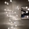 Lustre de bola de cristal de cereja americana moderna luz de escada duplex LED restaurante personalidade criativa lustre de meteoro
