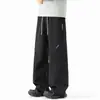 Calças de paraquedista estilo montanha para homens, calças softshell impermeáveis para atividades ao ar livre para mulheres, calças softshell leves para caminhada, calças de trabalho de perna reta folgadas