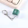 Dispositivo de eje de prueba mérito más una llave llavero luminoso acumulador de llaves colgante tapa de llave electrónica botón juego de descompresión