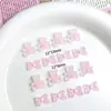 Explotaciones transfronterizas hielo a través de oso arco clavo joyería dibujos animados amor pendientes usar accesorios diy venta al por mayor
