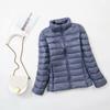 Chaqueta ligera de plumón para mujer, de color liso, con cuello alto, ajustada, de talla grande, para primavera, otoño e invierno, de moda, outlet de fábrica.