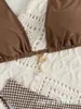 Comercio Electrónico Transfronterizo se Especializa en Suministrar Lotes Directos de Fábrica en Stock de Bikinis Sexys Europeos y Americanos Populares con Correas de Cuello Halter