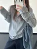 Temporada de descanso ligera algodón ligeramente elástico media tapeta abierta a rayas color block con capucha camiseta manga larga ajuste holgado mujer