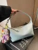 Bolsa de Mão Pequena de Luxo Transfronteiriça para Mulheres, Nova Moda de Verão 2025 Bolsa Versátil de Ombro Transversal, Bolsa Dumpling Super Popular