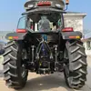 Tractor agrícola de cuatro ruedas para comercio exterior transfronterizo, arado diésel de ruedas grandes para invernadero, motocultor rotativo para voltear la tierra