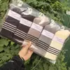 26 Calcetines Caídos de Media Pantorrilla para Mujer Otoño Invierno Calcetines de Pelo de Camello Calidez para Mujer Otoño Invierno Venta al por Mayor