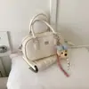 Bolsa de Mão Estilosa Xiaomi Mijia Tendência Bolsa de Boliche Feminina Moda Coreana Bolsa de Ombro Único Verão 2026 Nova Bolsa Transversal de Nicho