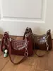 Bolso nuevo para mujer 2026, moderno y elegante, alto valor estético, bolso cuadrado pequeño, único y simple, color liso, bolso de hombro y cruzado, versión coreana