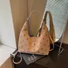 Bolso de hombro de lunares retro transfronterizo para mujer, nuevo modelo de otoño 2026, bolso de mano de moda de gran capacidad para el día a día
