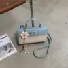 Bolso para mujer de diseño de nicho estilo francés, nuevo modelo 2026, bolso cruzado versátil de color block, bolso de mano cuadrado pequeño moderno y súper popular