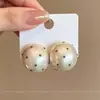 Pendientes Dorados de Lujo Ligero Vintage de Alta Gama para Mujer 2026 Nuevo Estilo Pendientes de Perla con Agujas de Plata Diseño de Nicho Accesorios Metálicos para Orejas