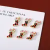 Venta al por mayor de fábrica joyería de aleación para arte de uñas parche de uñas copo de nieve diamante campana serie navideña pegatina para uñas
