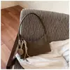 Fábrica de origem de comércio exterior transfronteiriço moda retrô feminina 2026 nova bolsa de ombro transversal de grande capacidade