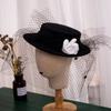 Sombrero hongo estilo europeo femenino Francés Hepburn Capucha malla flor retro pequeño sombrero hongo niña con foto británica República de China