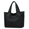 Bolsa tote feminina de grande capacidade para exportação, adequada para o dia a dia, uma bolsa de ombro da moda e tendência estilo coreano, uma bolsa de mão casual para mulheres