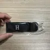 Bestseller transfronterizo: Cinturón perezoso portátil marrón con hebilla ajustable, estilo casual para exteriores, gancho metálico táctico, cintura elástica