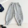 Valle del Viento 2026 Invierno Nuevo Estilo Coreano Fresco Pantalones Deportivos con Letras para Niños, Forrados de Felpa y Engrosados, Pantalones Deportivos Personalizados para Niños