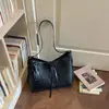 Bolsa de ombro e axila da moda transfronteiriça 2026, bolsa de tecido nicho de grande capacidade, bolsa de mão, bolsa de ombro tipo balde