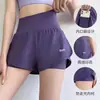 Nuevos shorts deportivos transfronterizos, diseño falso de dos piezas, secado rápido, pantalones de yoga anti-exposición con bolsillos, shorts de fitness para mujer
