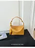 Exquisita bolsa de lancheira tecida para mulheres, bolsa estilo dumpling de couro macio de novo estilo, bolsa de ombro única transversal, bolsa de axila