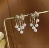 Pendientes de Borla de Perla con Lazo de Zirconia Super Hada Dos Formas de Usar Pendientes Elegantes Versátiles de Personalidad Estilo Coreano para Mujer Pendientes