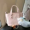 Bolsa pequena feminina 2026 novo modelo primavera/verão, textura de alta qualidade, design de nicho, bolsa transversal versátil vintage, bolsa de mão tipo balde