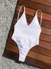 Traje de baño de una pieza de comercio exterior europeo y americano transfronterizo 2027, traje de baño sexy ajustado de color liso sin espalda con cordones para mujer, talla grande
