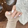 Nuevas tiras de arte de uñas listas para usar al por mayor redondas cortas estilo coreano lunares coloridos rosa nude lindo femenino arte de uñas