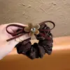 Goma para el pelo retro floral Melard con flores aterciopeladas, lazo de pedrería, liga para el pelo, accesorio para el pelo al por mayor