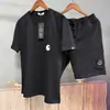 CP. Camiseta de Cuello Redondo de la empresa Foreign Trade con Logo Bordado de Lente, Mangas Cortas, Bolsillo, Bolsillos Laterales Funcionales, Pantalones de Chándal con Lente, Pantalones Cortos