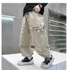 Pantalones Largos para Niños Primavera y Otoño 2026 Estilo Nuevo Pantalones Casuales Rectos para Niños Pantalones Cargo para Niños Grandes Elegantes de Moda