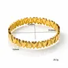 Pulsera de acero de titanio con cierre de corazón entrelazado abierto de lujo ligero de nicho