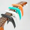Capo para Guitarra y Afinador Combo al por Mayor en Stock, Afinador de Guitarra Acústica de Plástico Multiusos