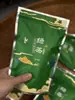 Té embolsado de supermercado Té oolong Tieguanyin Té negro pequeño Zhengshan Té de jazmín Té verde Té Biluochun puesto de té