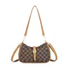 Al por mayor transfronterizo 2026 nuevo bolso cruzado retro viejo floral para mujer práctico versátil madre de mediana edad bolso de axila moderno para mujer