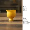 Juego de té de cerámica amarillo limón con detalles dorados, que incluye una taza con tapa, tetera, taza de maestro, taza de degustación, taza de té, soporte para tetera, posavasos y taza de equidad