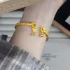 Mismo estilo que las joyerías, oro arenado, pulsera de bambú con juntas método antiguo, para mujer, lujo ligero, diseño de nicho, accesorio de mano versátil