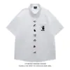 Camisa de estilo retro japonés con bordado de cachorro y cuello tipo polo para hombre y mujer, de verano, holgada, moderna, estilo universitario, versátil