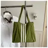 Bolso tote de lona de gran capacidad estilo casual coreano 2026 para mujer, nuevo bolso de mano de moda para estudiantes, adecuado para la escuela y el trabajo