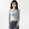 Top de yoga de malla transparente tipo dos piezas para mujer con copas fijas, ajustado, que deja ver la cintura, de manga larga para correr y fitness