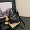 Bolsa de ombro South Wind da moda e de alta qualidade para o outono/inverno de 2026, de grande capacidade, moderna, para e-commerce transfronteiriço e transmissões ao vivo